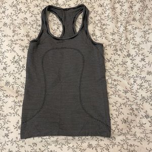 Size 4 striped lulu top New condition